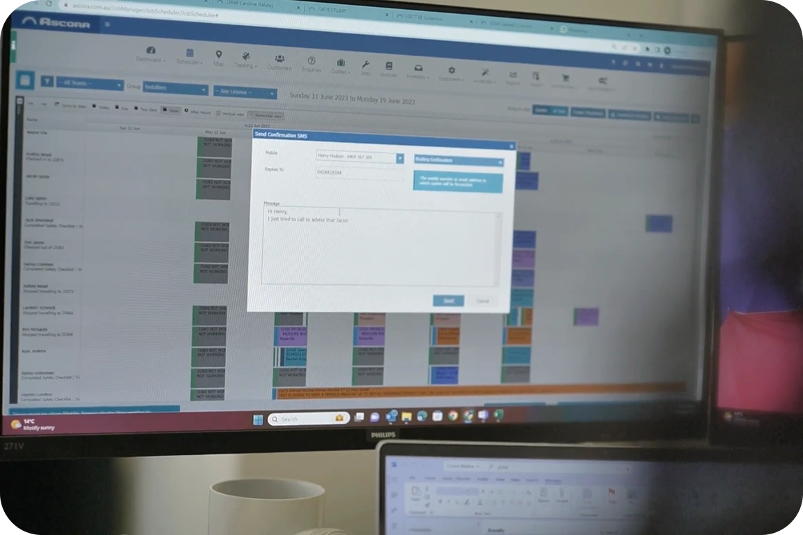 Image featuring a tradie fixing a door