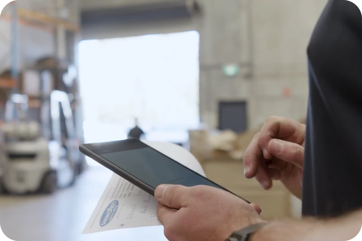 Image featuring a tradie fixing a door