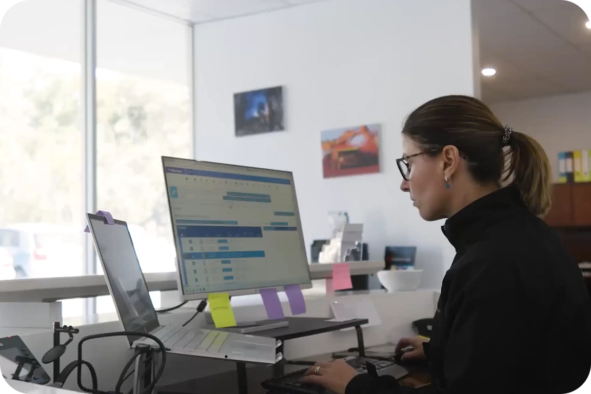 Image featuring a tradie fixing a door