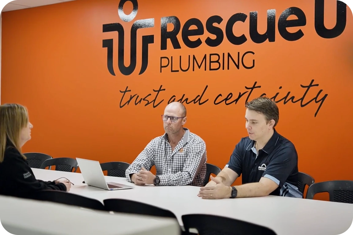 Image featuring a tradie fixing a door